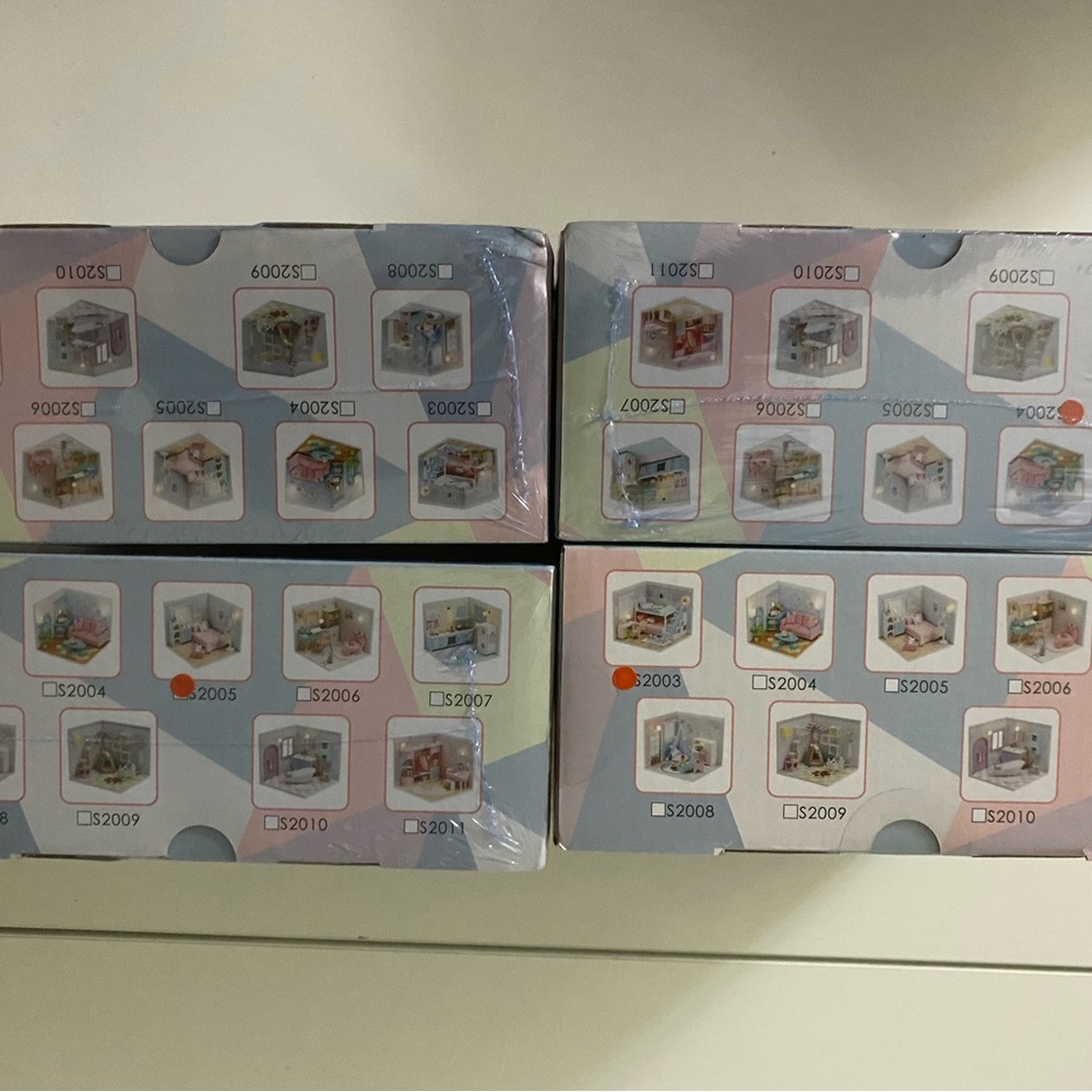 Set of 4 miniature model homes